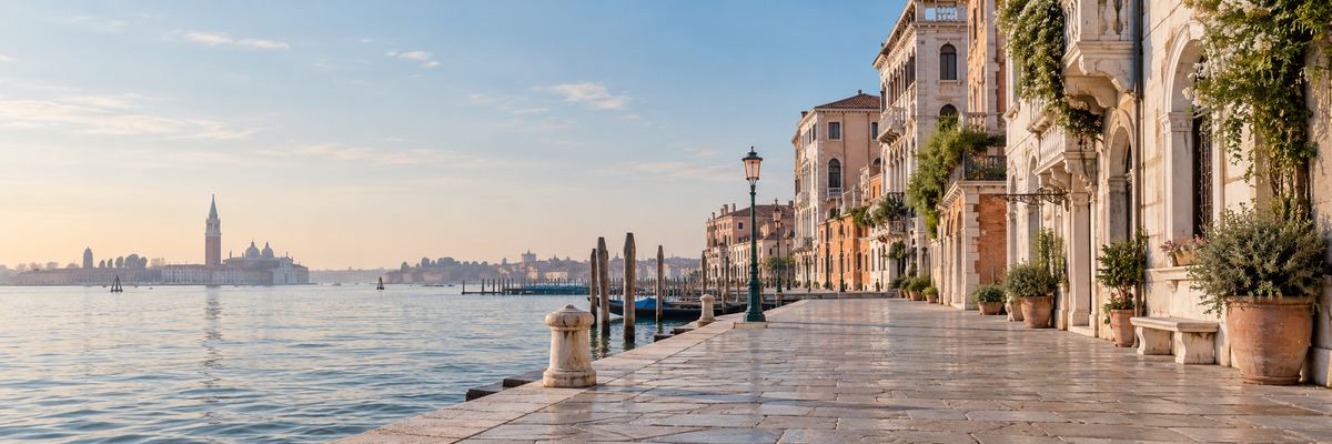 Illustrated Venetian waterfront with historic Italian architecture and a calm lagoon
